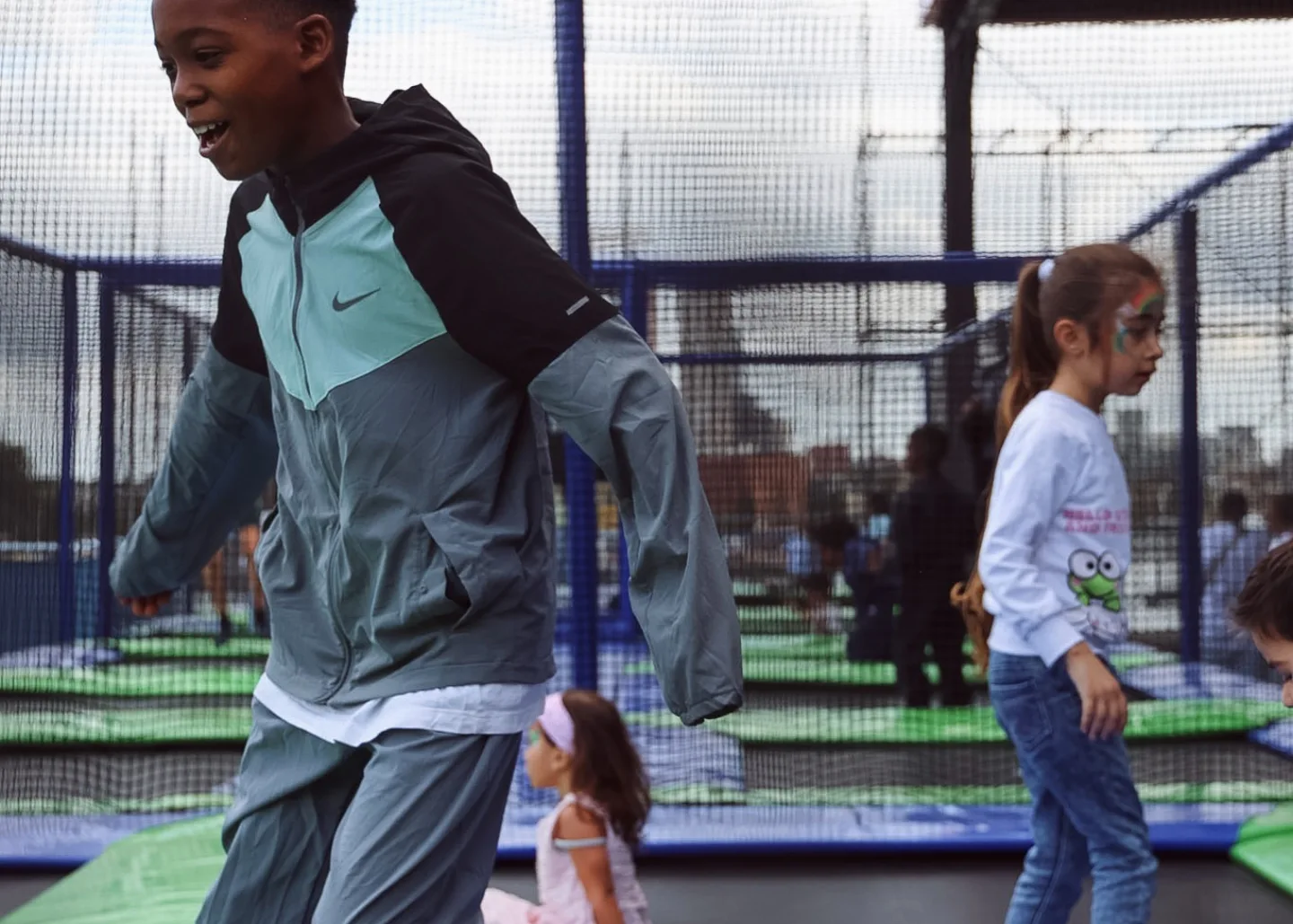 Children jumping on the trampolines at Spelen bij Beelen