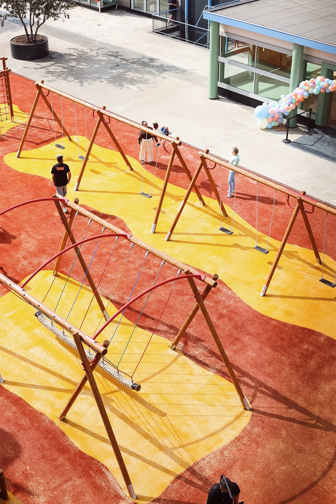 Children playing in the outdoor playground at Spelen bij Beelen